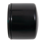 Close-up image of a cylindrical automotive oil filter with a black metallic exterior and a threaded center surrounded by several circular holes.